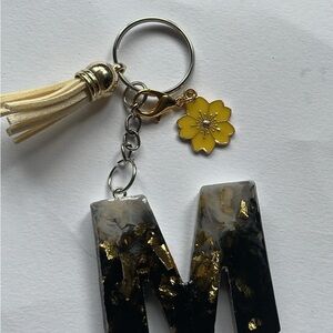 Gold and Black Keychain with Tassel and Flower Charm